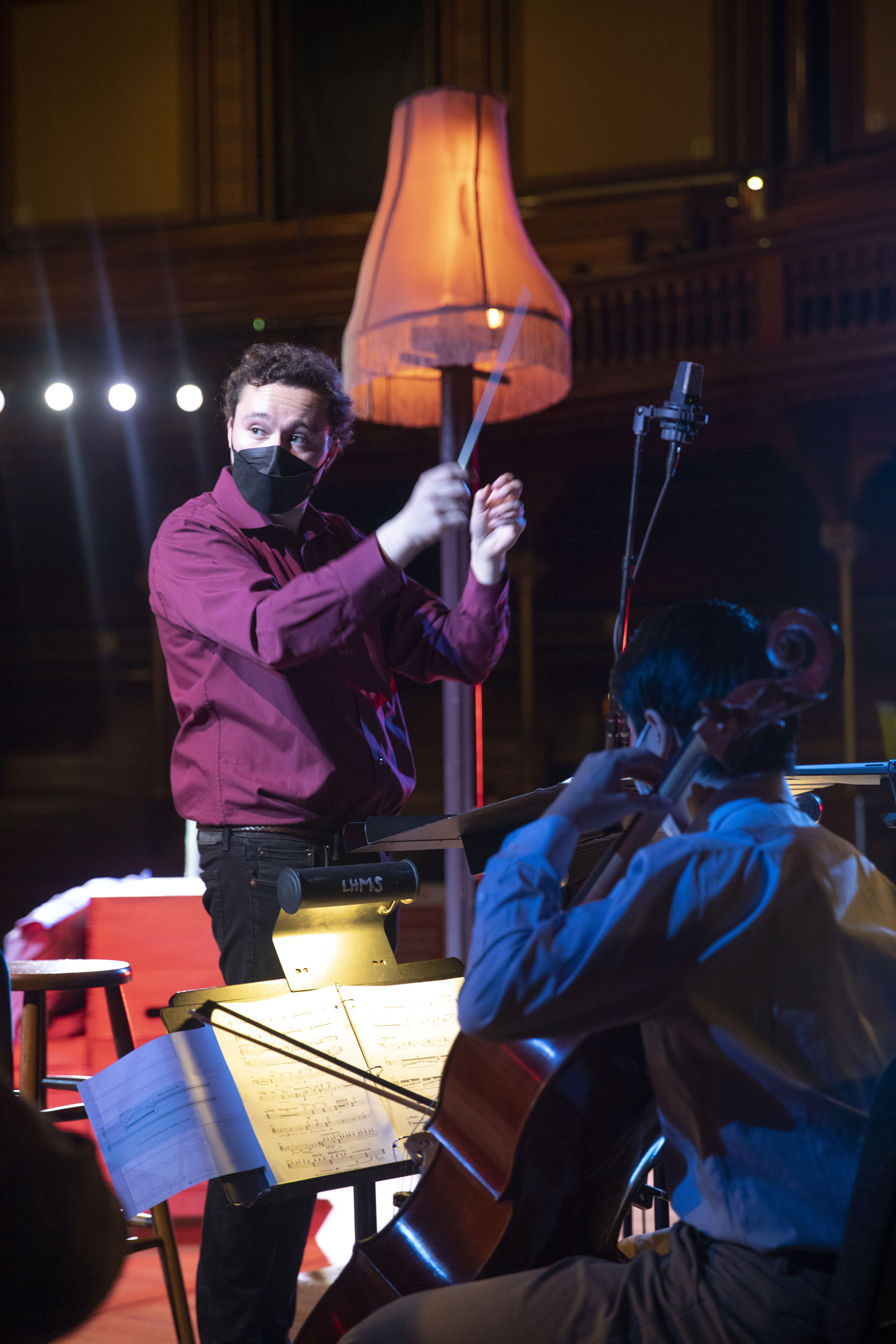 Benji Wenzelberg (left) conducts Nathan Le ’22.