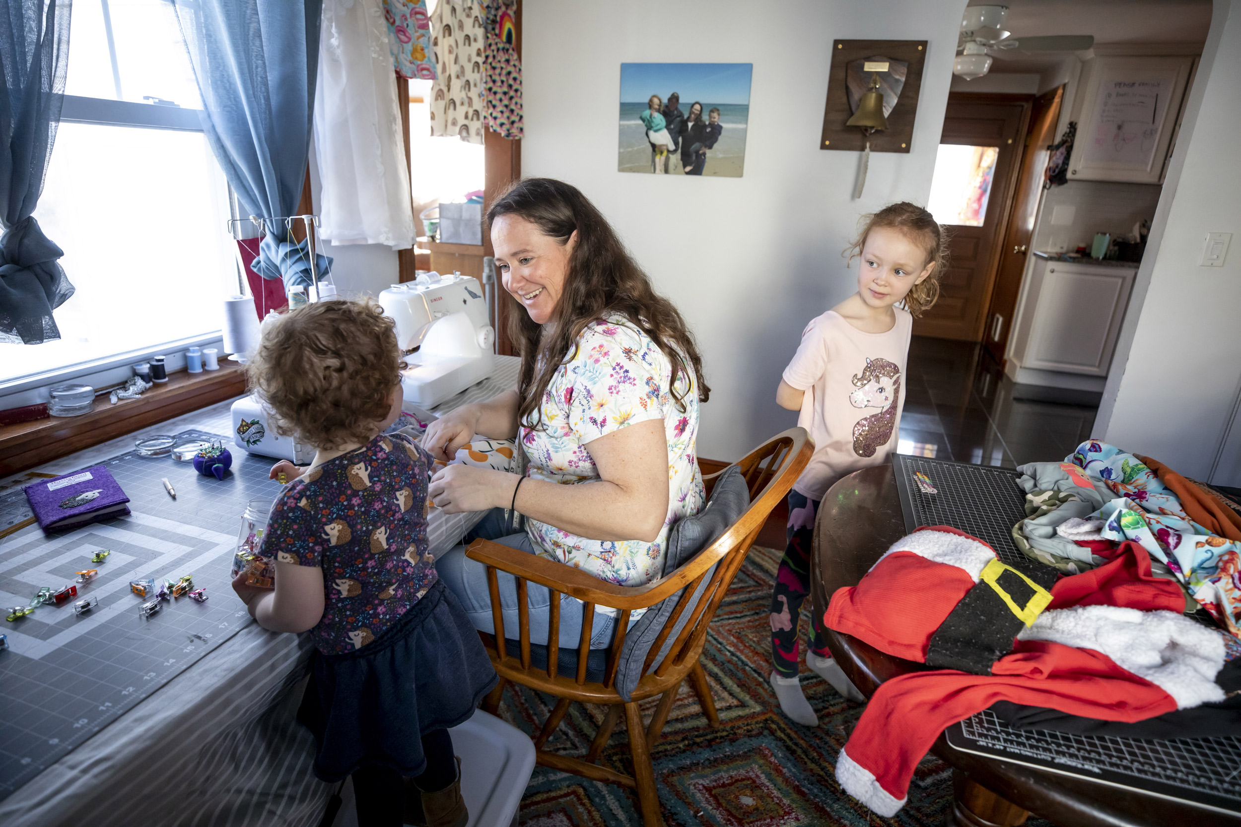 Kate Pease with her daughters.