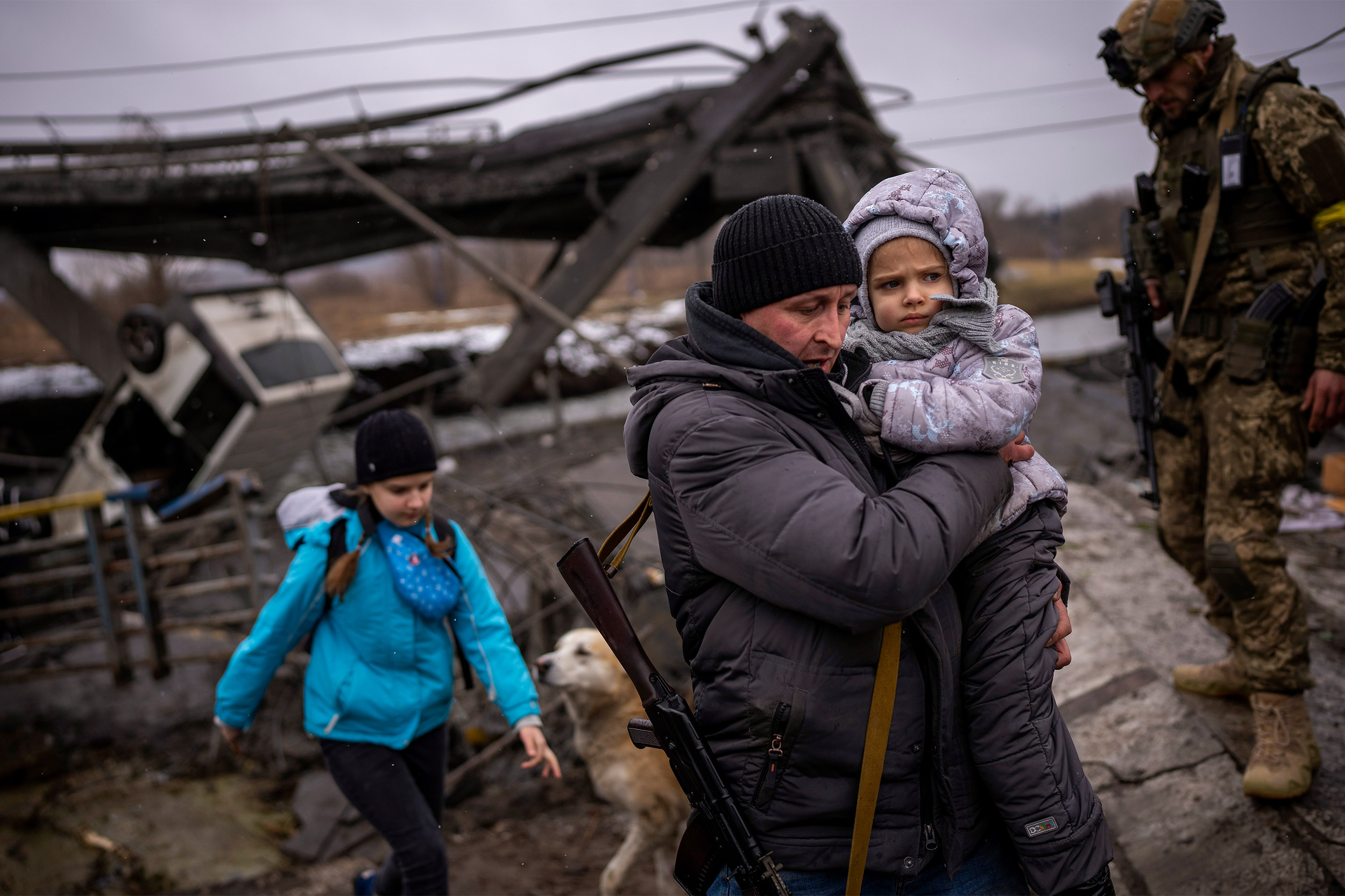 Fleeing family outside of Kyiv.