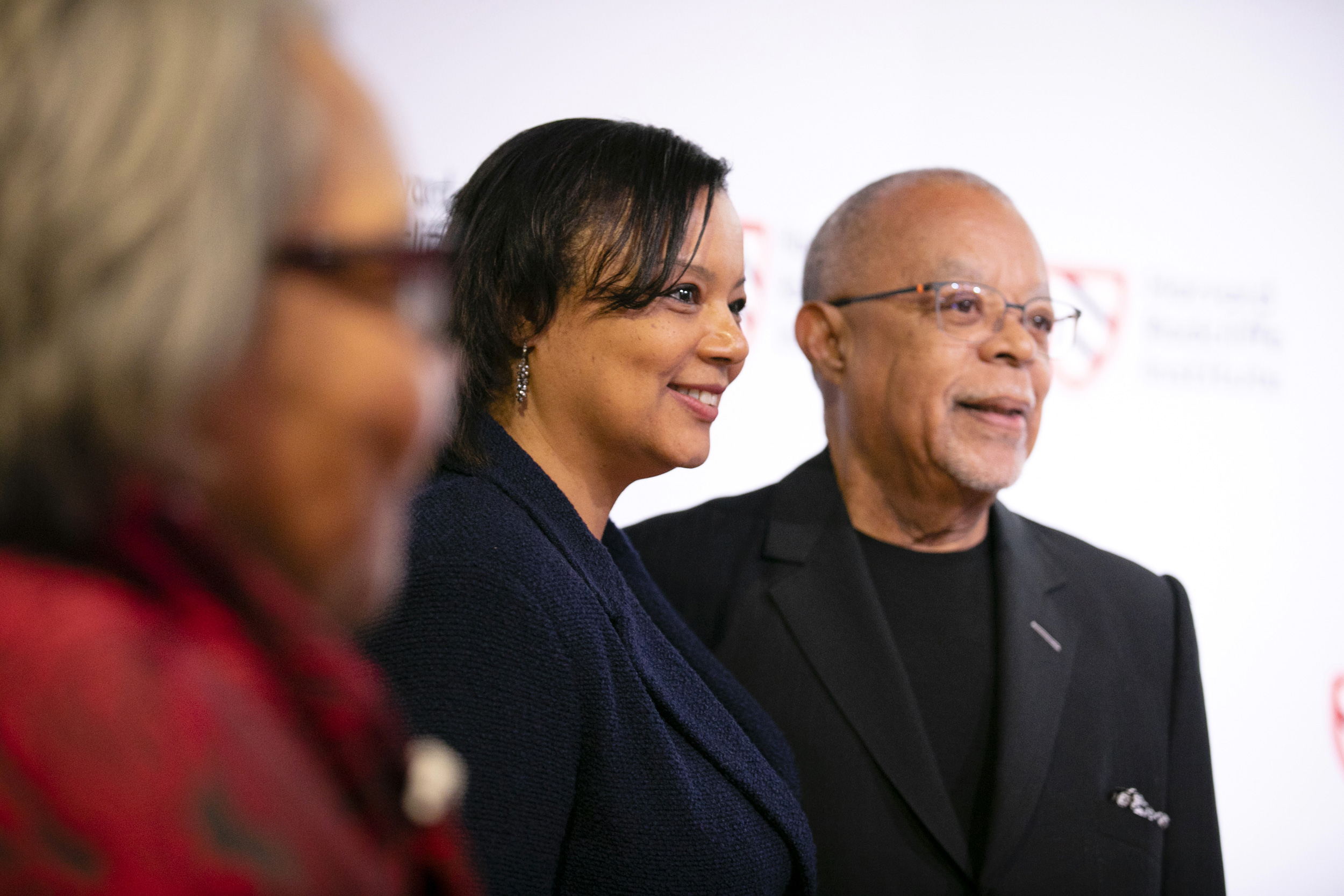 Dean Tomiko Brown-Nagin (center) and Harvard Professor Henry Louis Gates Jr.