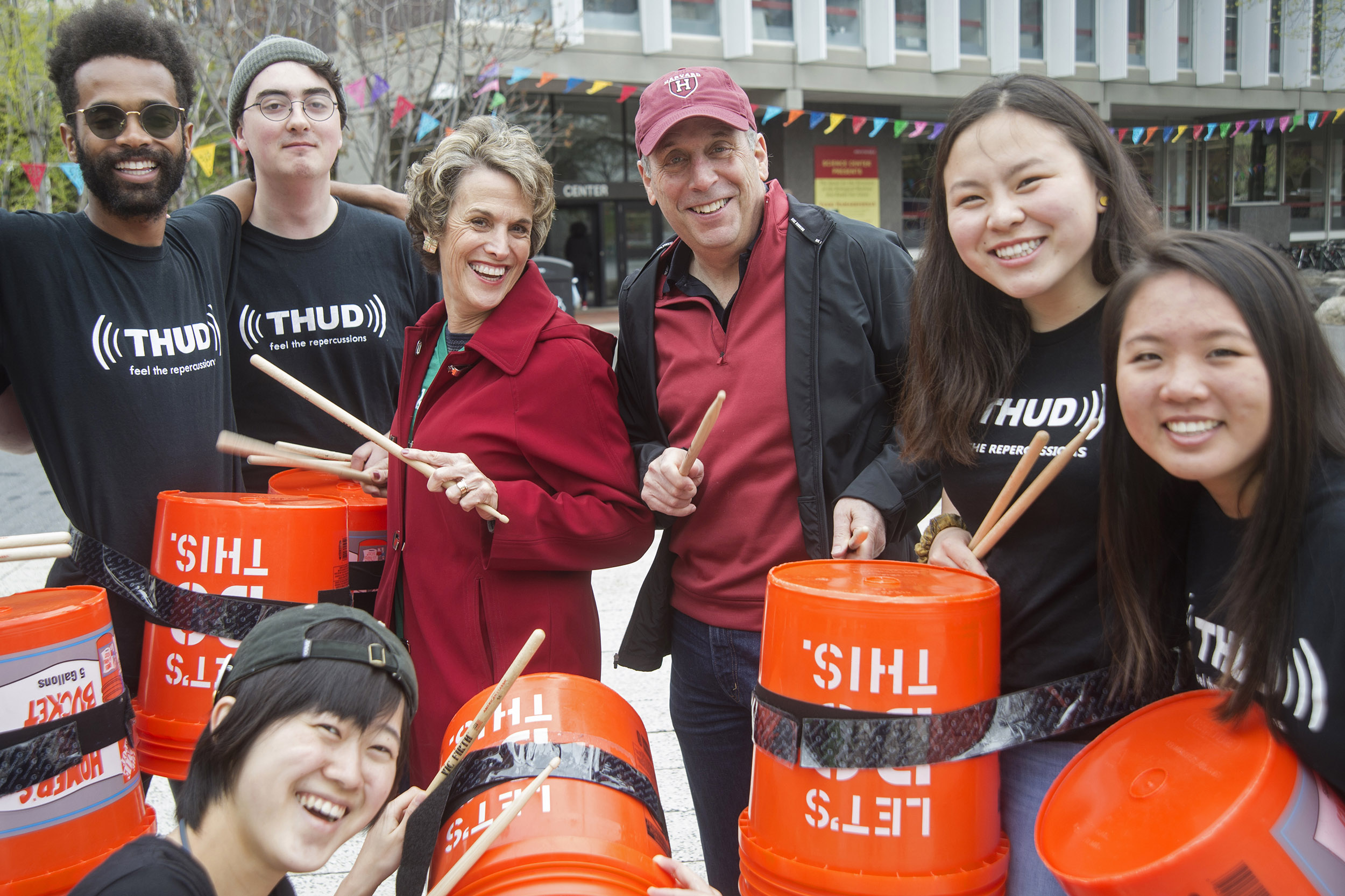 Adele and Larry Bacow with members of student percussion troupe THUD at Arts First.