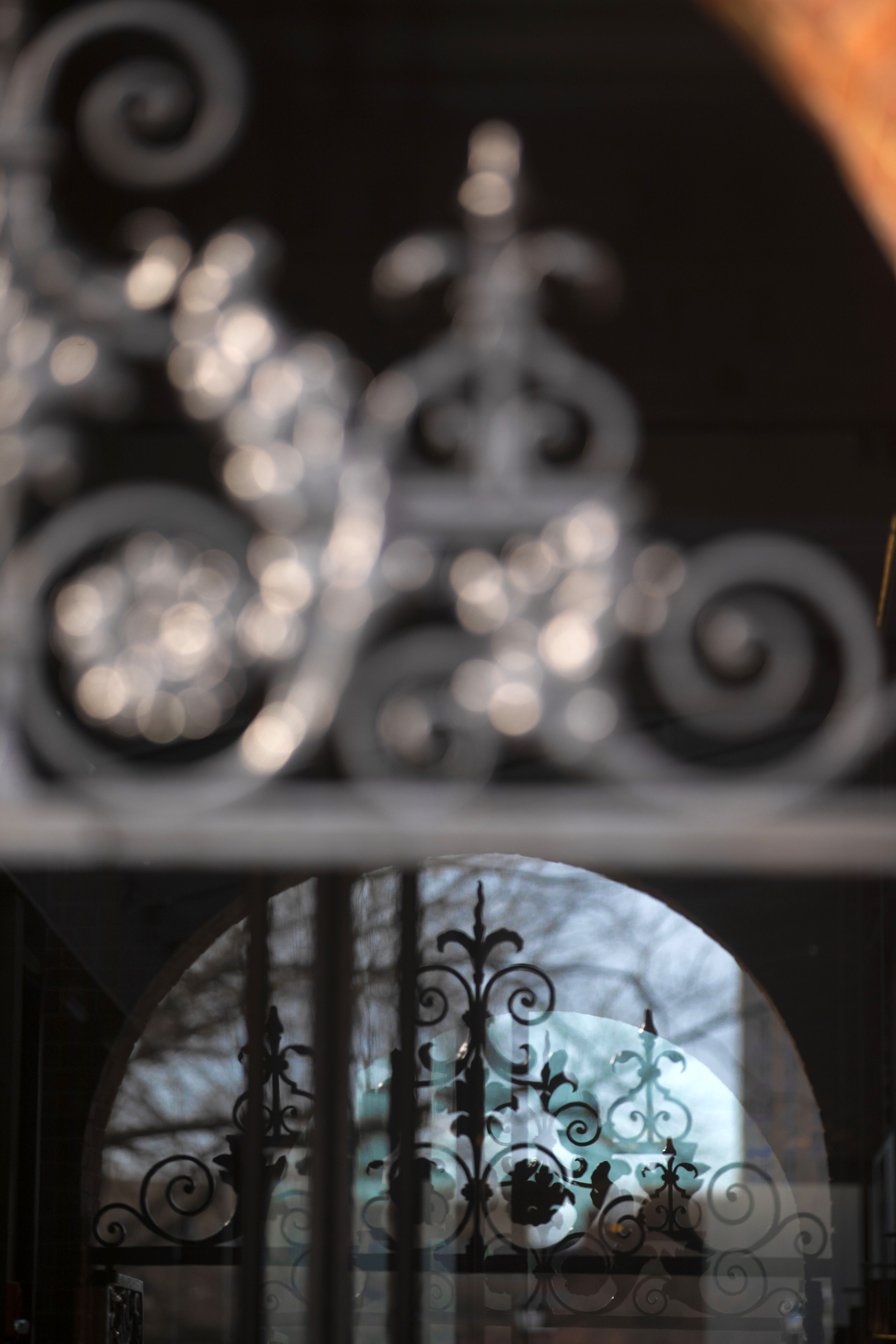 An ornate gate decorate Leverett House.