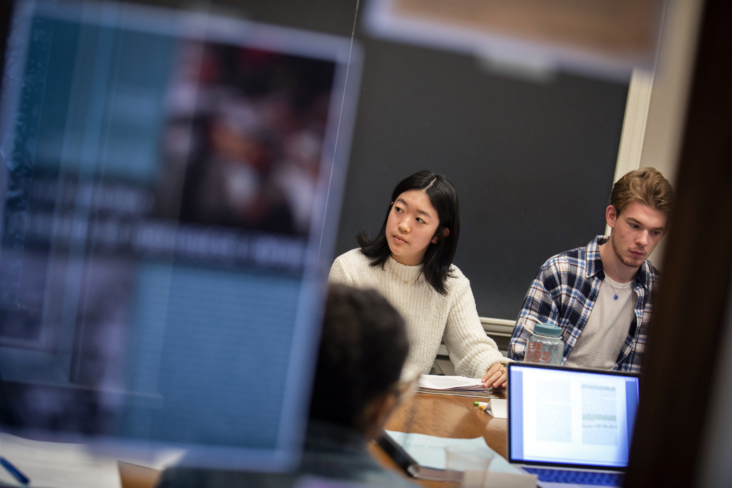 Esther Kim ’26 (left) and Connor Riordan ’23 participate