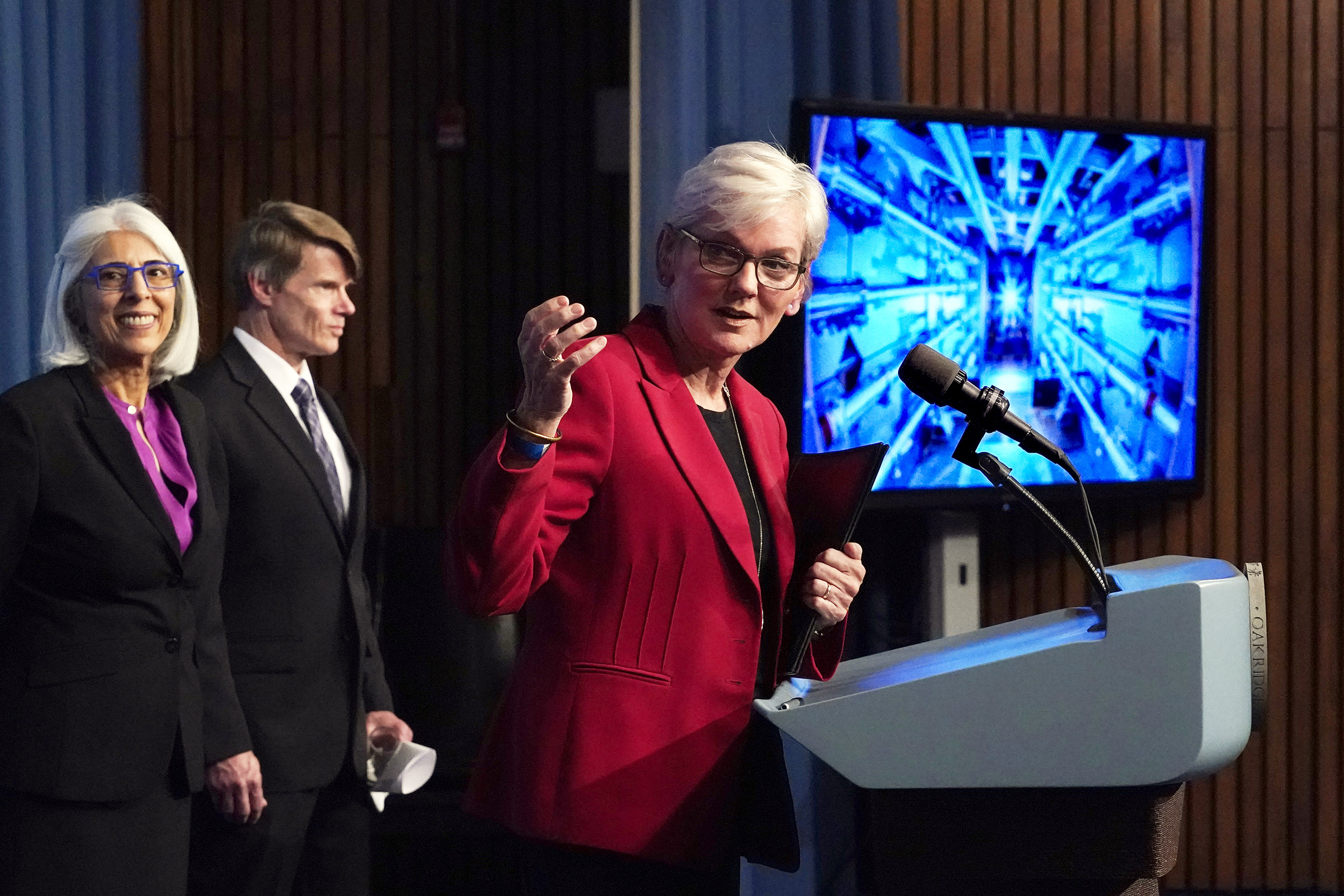 Jennifer Granholm, Arati Prabhakar, Marvin Adams at a news conference at the Department of Energy in Washington.