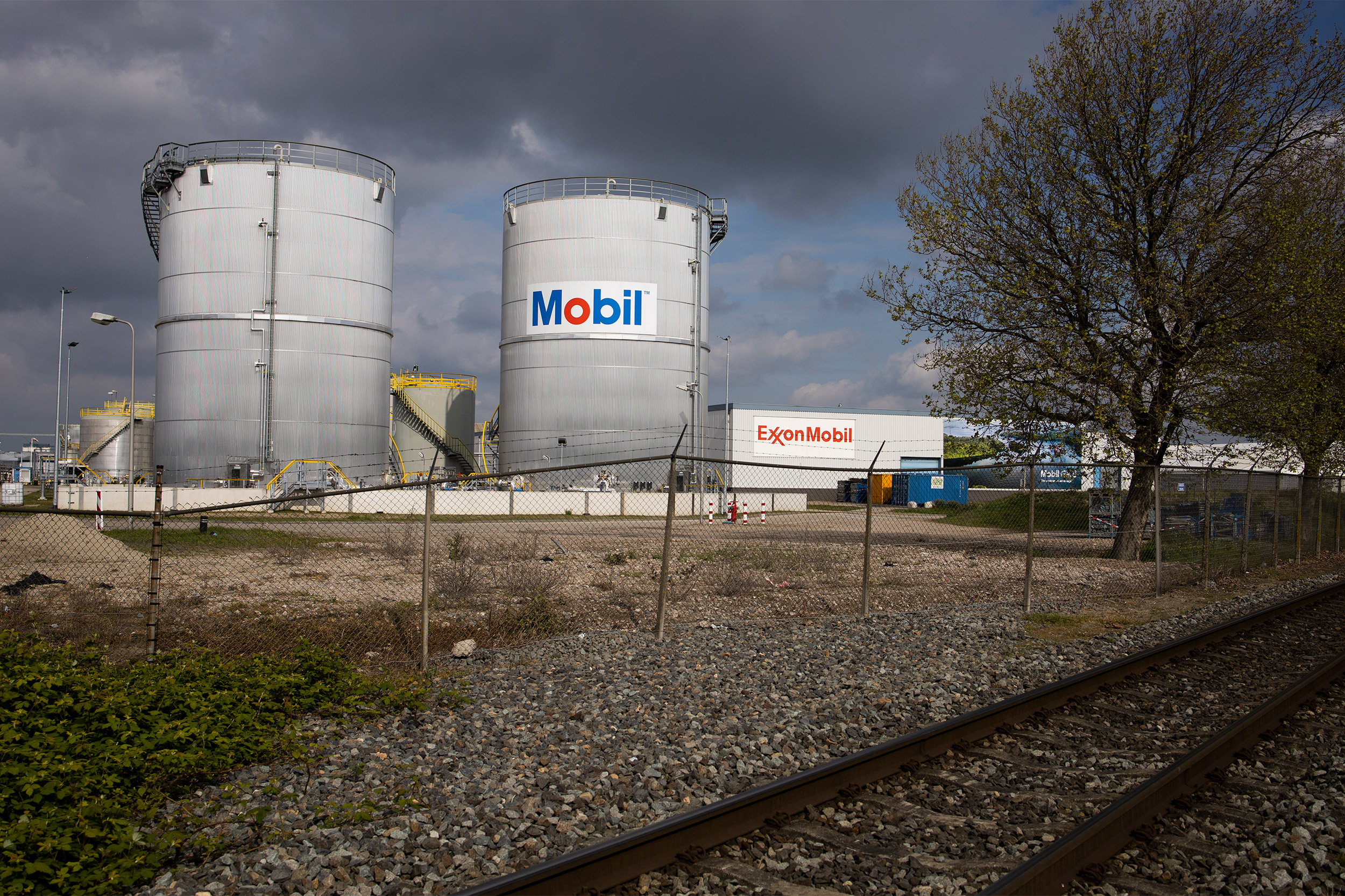 View of Exxon Mobil storage tanks of the petrochemical industry in the port of Rotterdam, Netherland