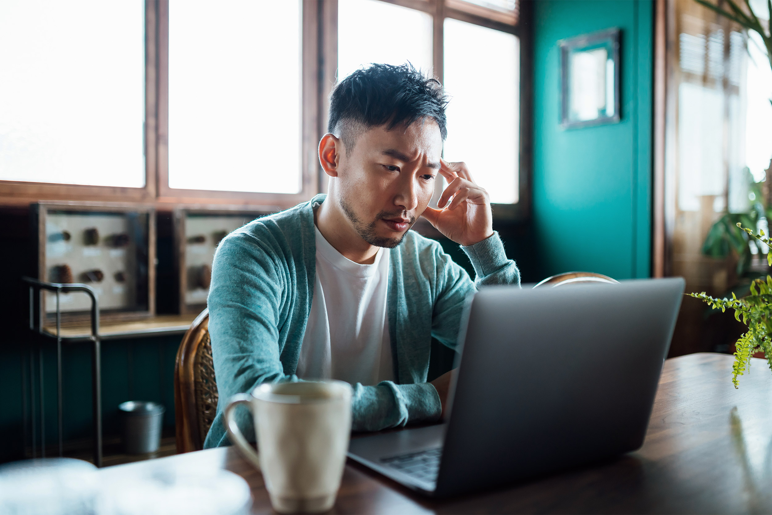 Man looking at computer.