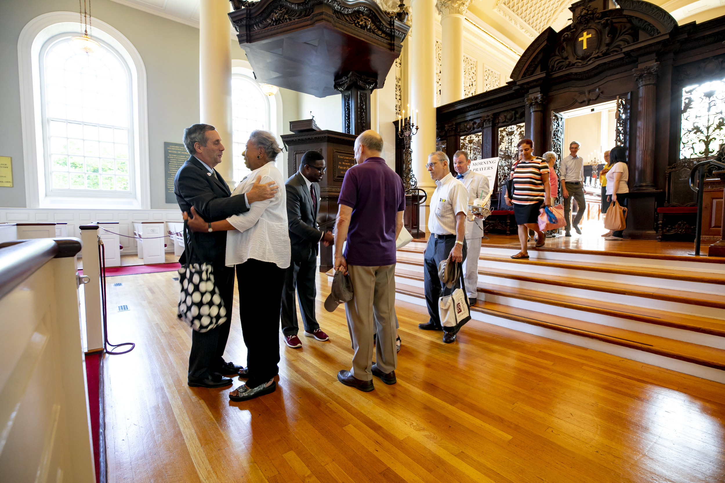 After speaking at the first Morning Prayers of his presidency, Bacow greeted Florence Ladd, retired director of Radcliffe Bunting Institute, and other attendees as they left Memorial Church.