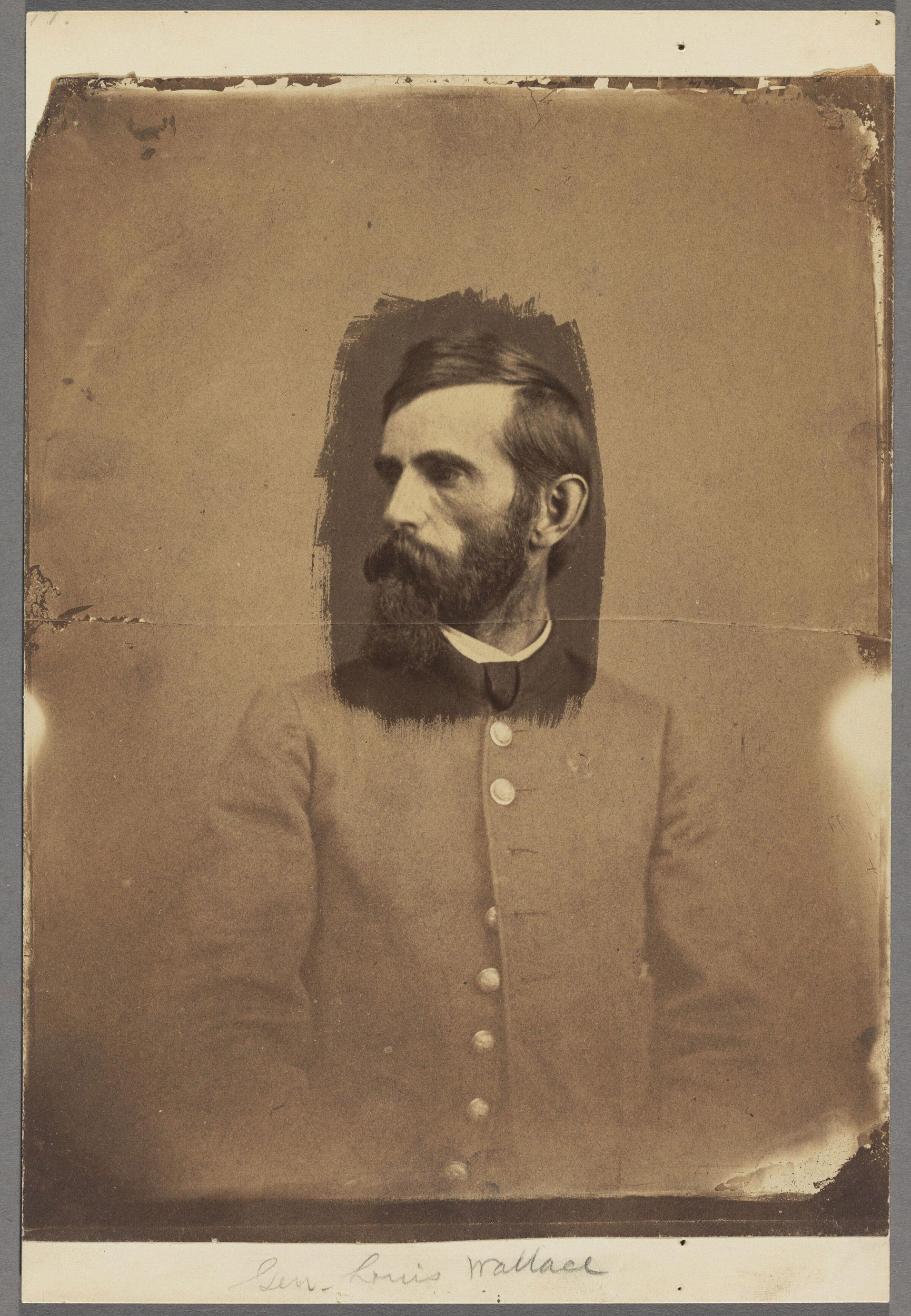 Salt print of Lew Wallce shows only the face coated and the rest of the image faded.