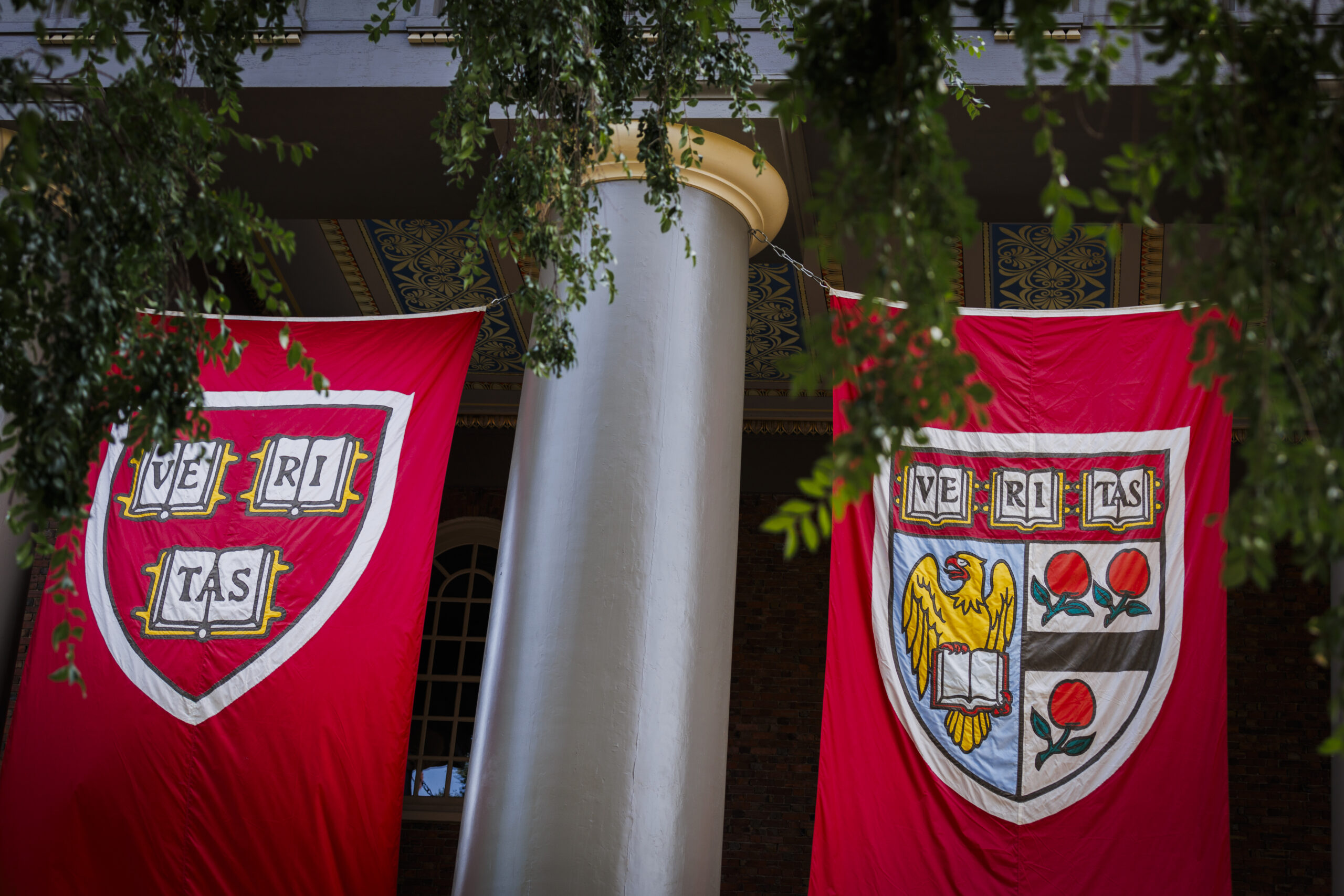 Veritas shields are on display outside Memorial Church.