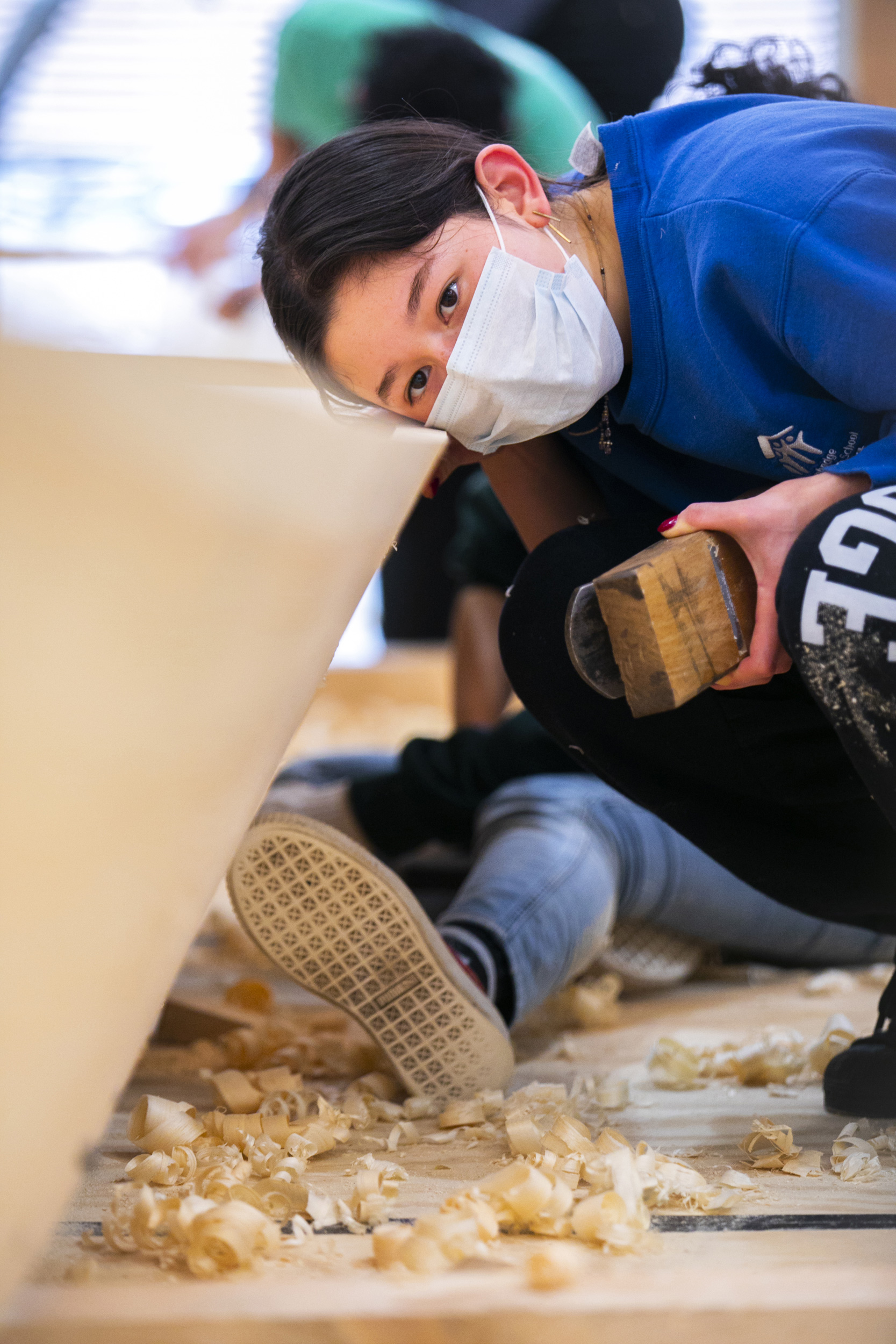 Students building a Japanese river skiff.