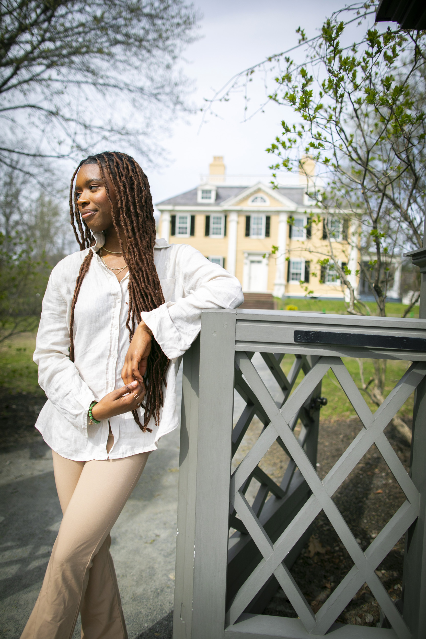 Mia Word ’24 is pictured outside Longfellow House.