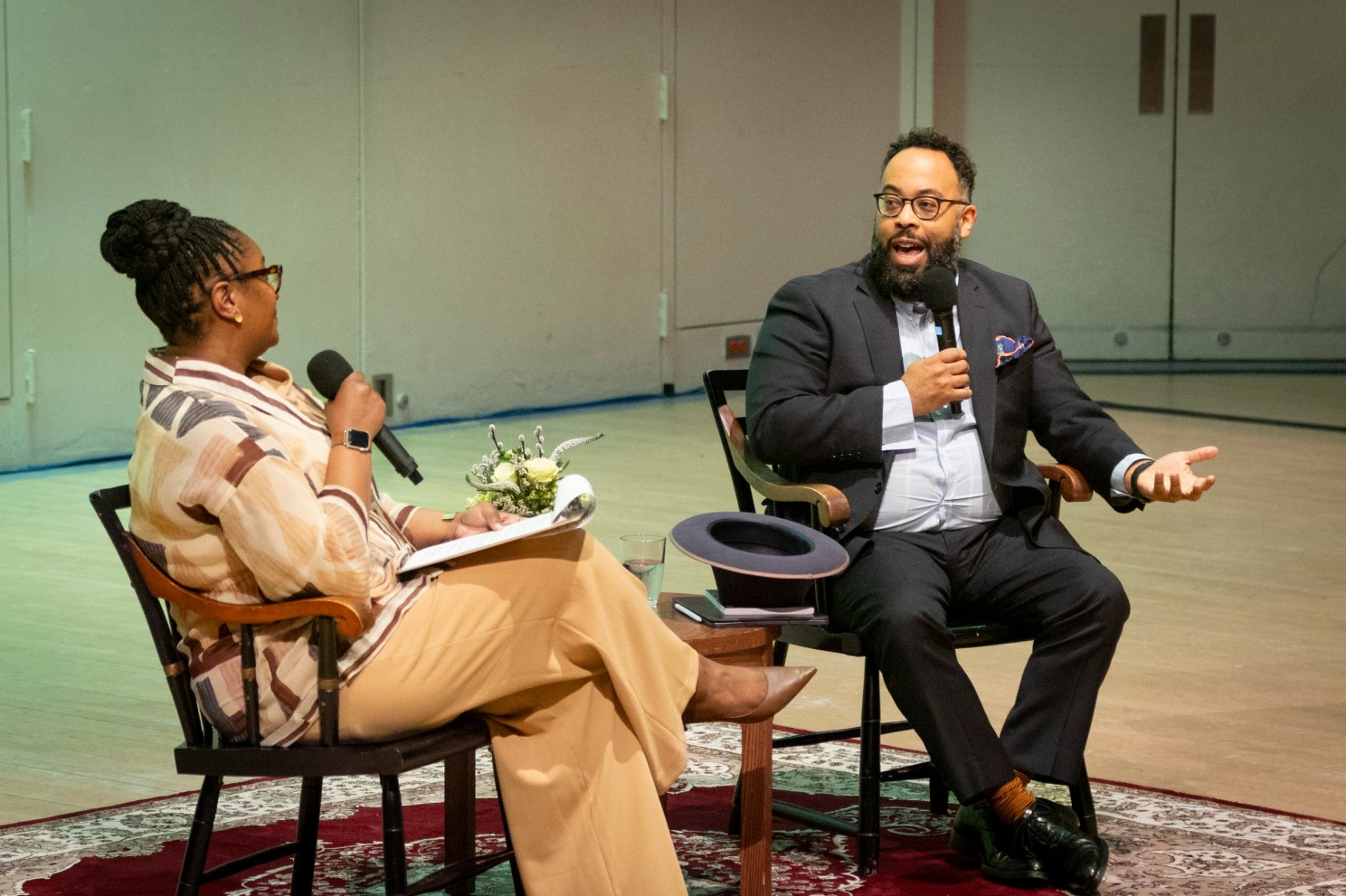 Kevin Young with Brenda Tindal, chief campus curator for the Faculty of Arts and Sciences.