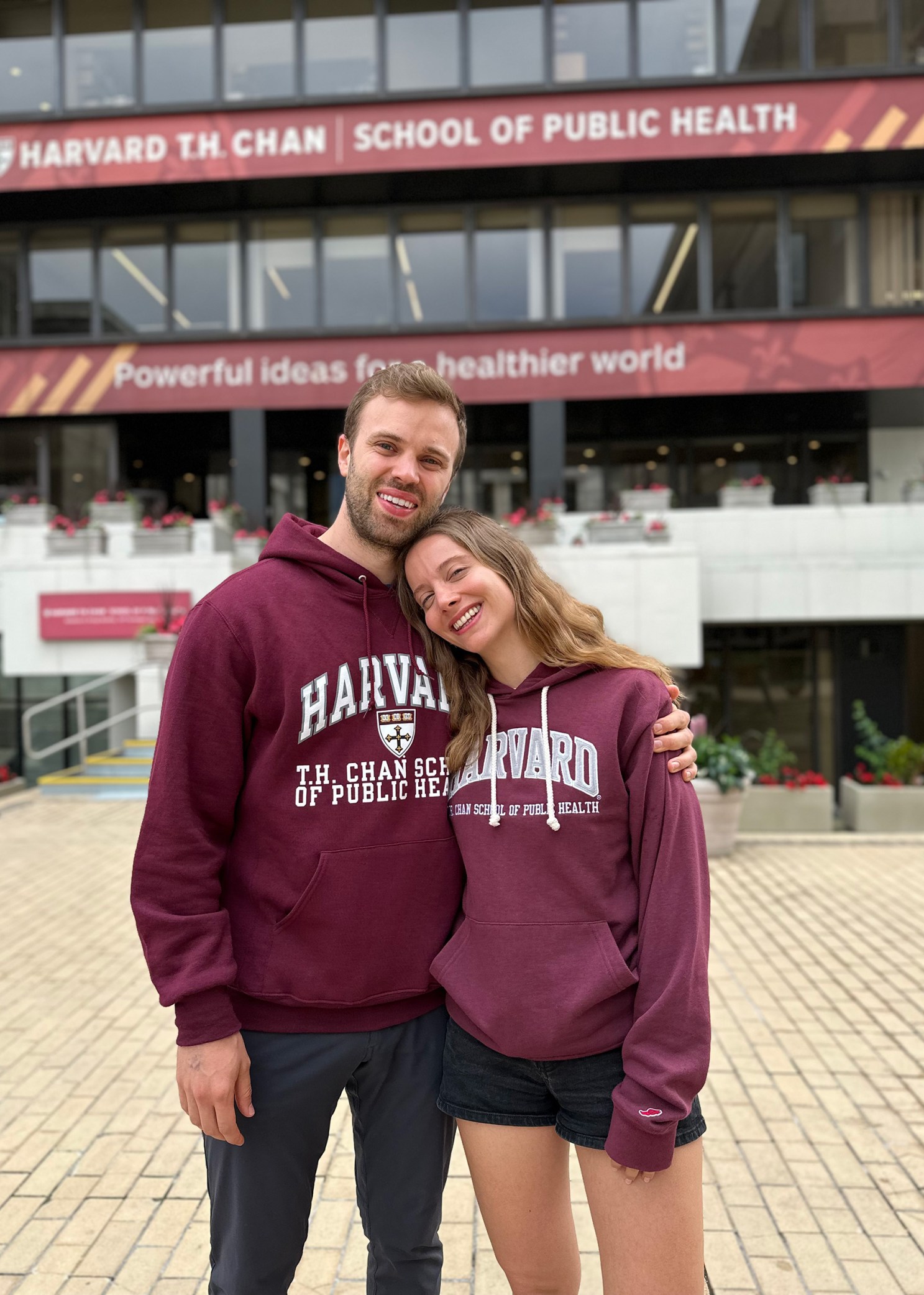 Alan Rheaume and Seray Sener in front of Harvard T.H. Chan School of Public Health.