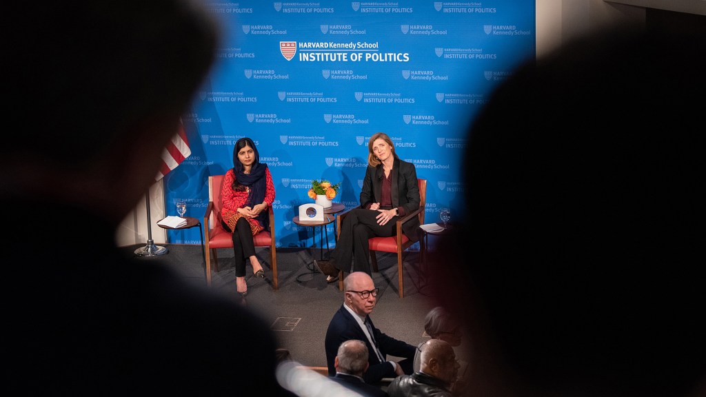 Malala Yousafzai and Samantha Power sitting on stage