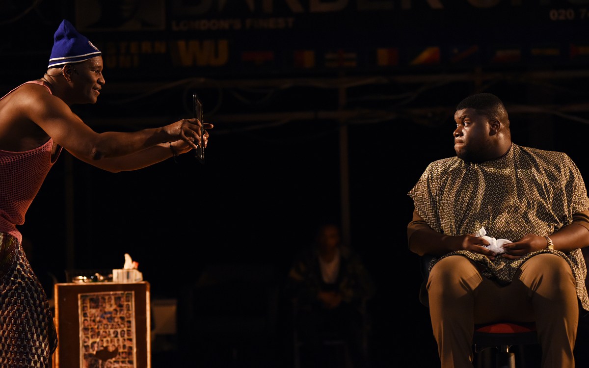 Patrice Naiambana and Tuwaine Barrett in Barber Shop Chronicles.