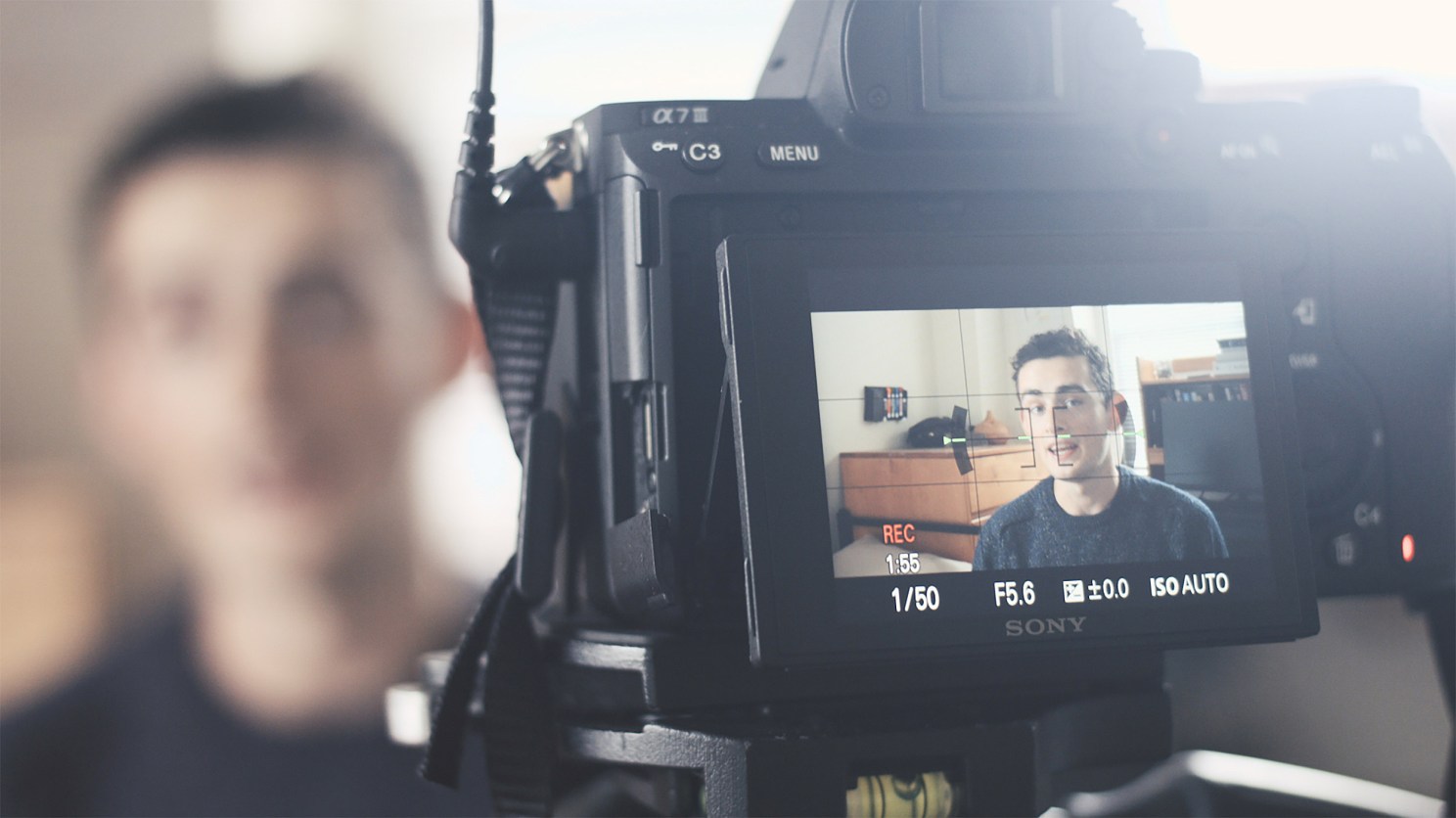 John Fish records video.