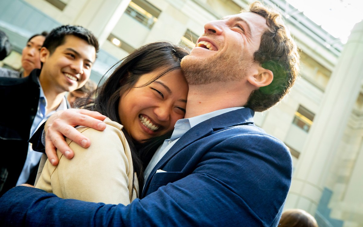 Diana Miao hugs a friend to celebrate residency.