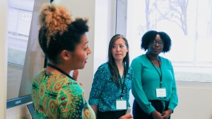 Yasmene Mumby (from left), Bonnie Lo, and Charisse Taylor give a flash talk