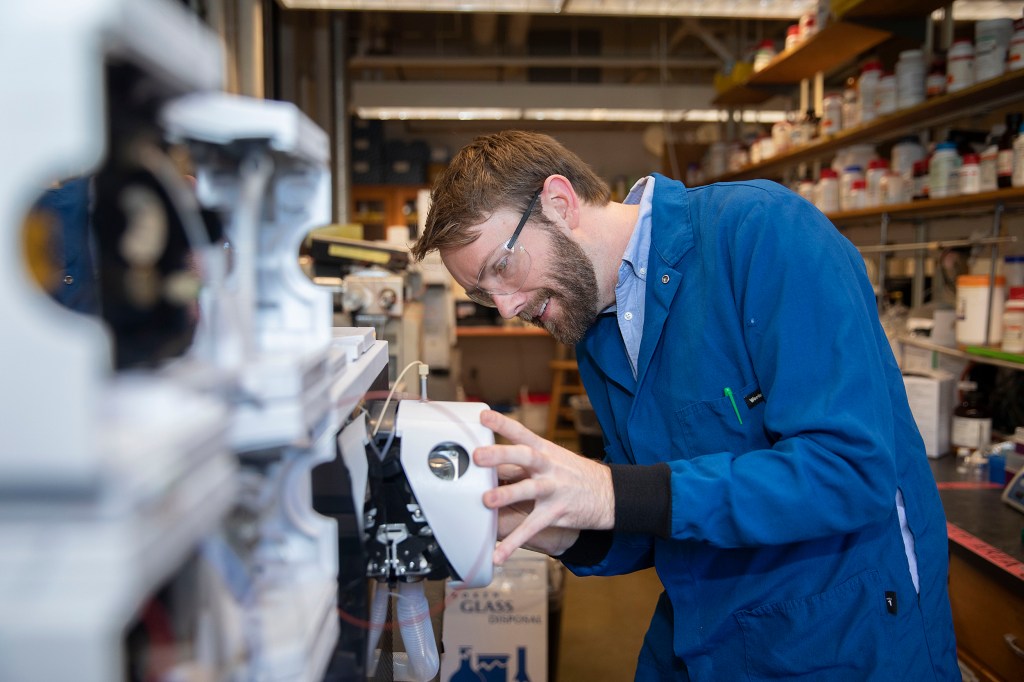 Brian Cafferty works in the lab.