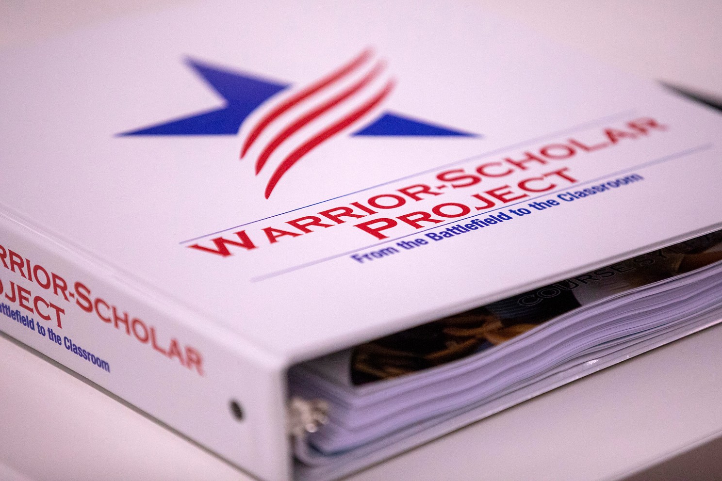 Binder with Warrior-Scholar Project logo