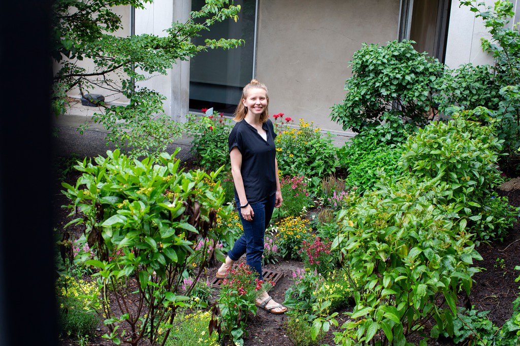 Tia Akins in the rain garden