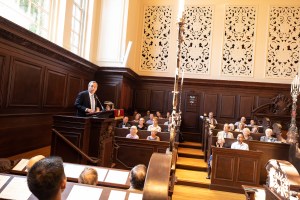 Larry Bacow speaking in church