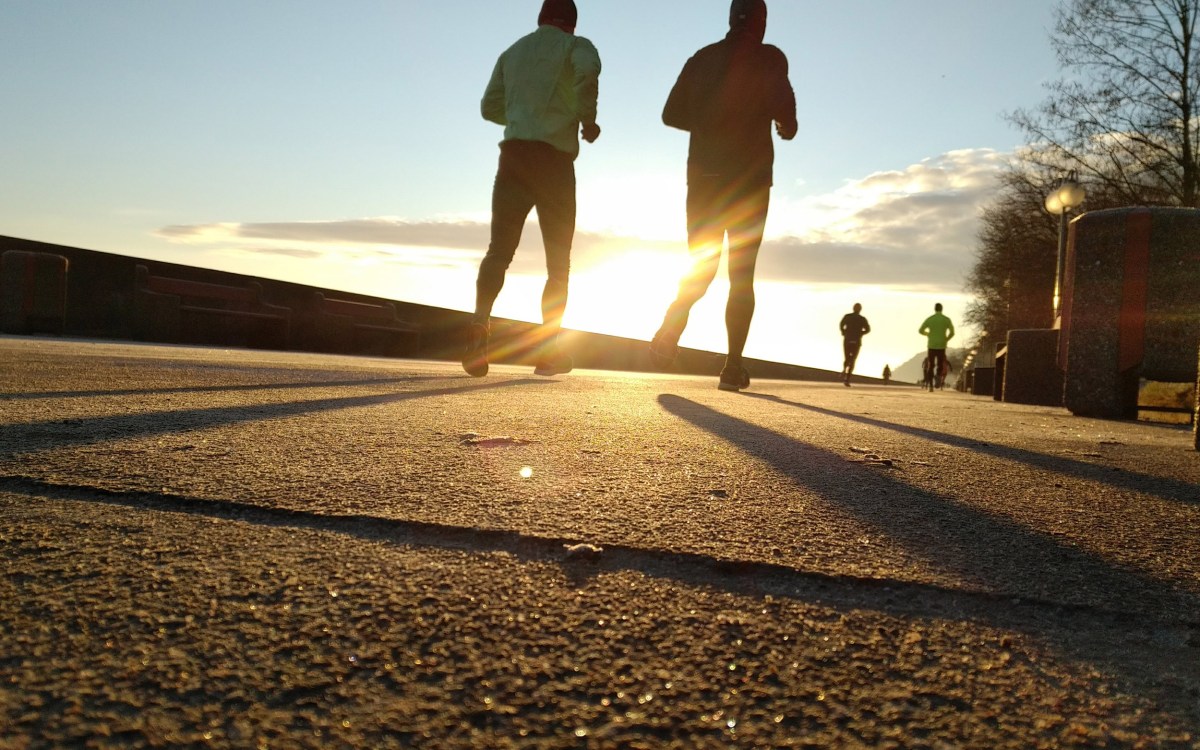 Two men running.