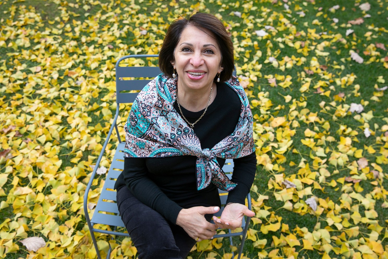 Woman sitting on bench.