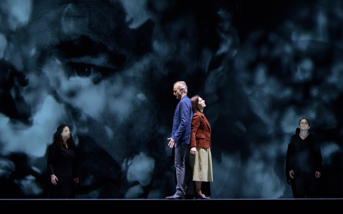 People on a stage performing an opera.