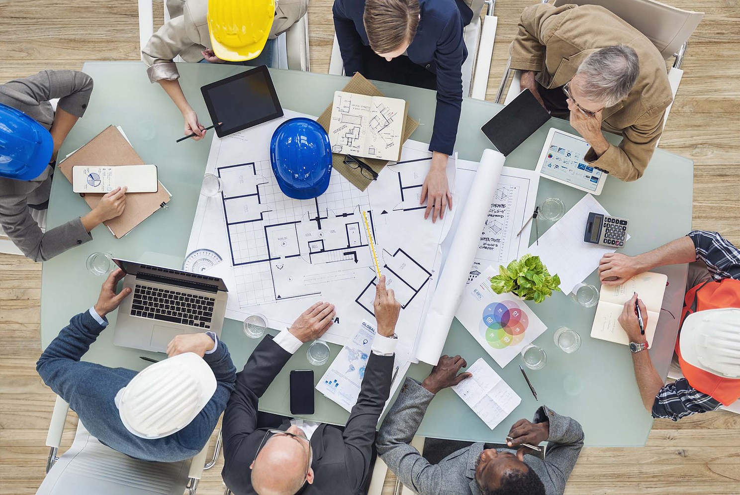 Architects working around a table.