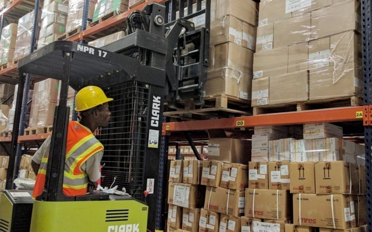 Man in supply warehouse.