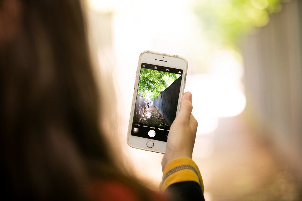 Person holding a smartphone.