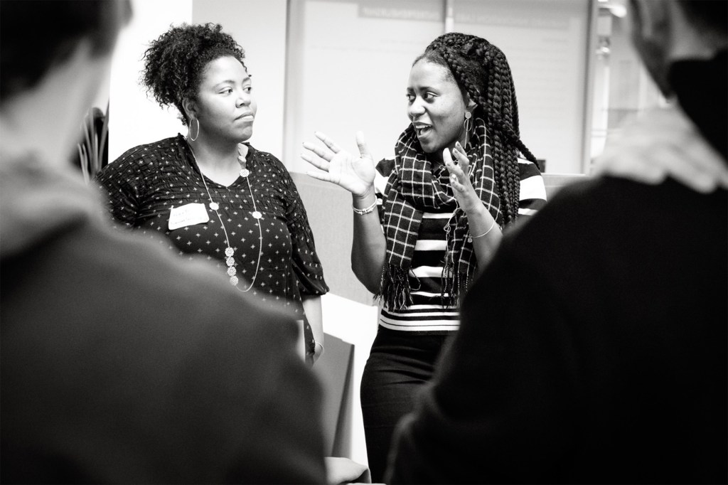 Women from the Studio speaking.