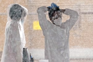 Health care workers in Texas testing for COVID-19.