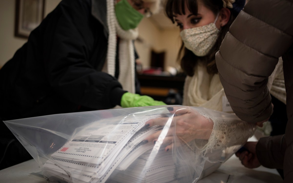 Election staff packing ballots.