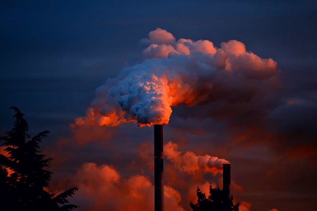 Smokestack spewing pollution.