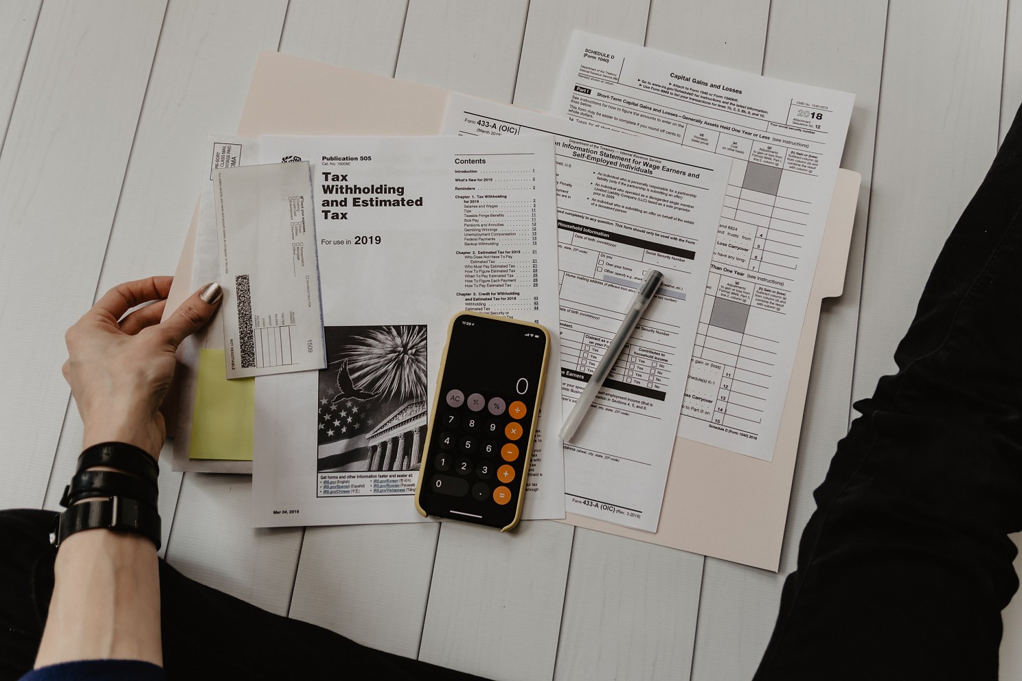 Overhead view of tax documents.