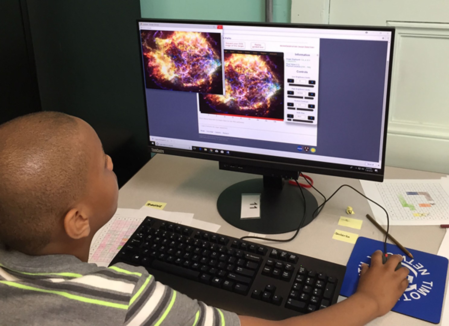 Student using computer.