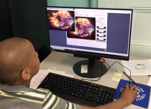 Student using computer.