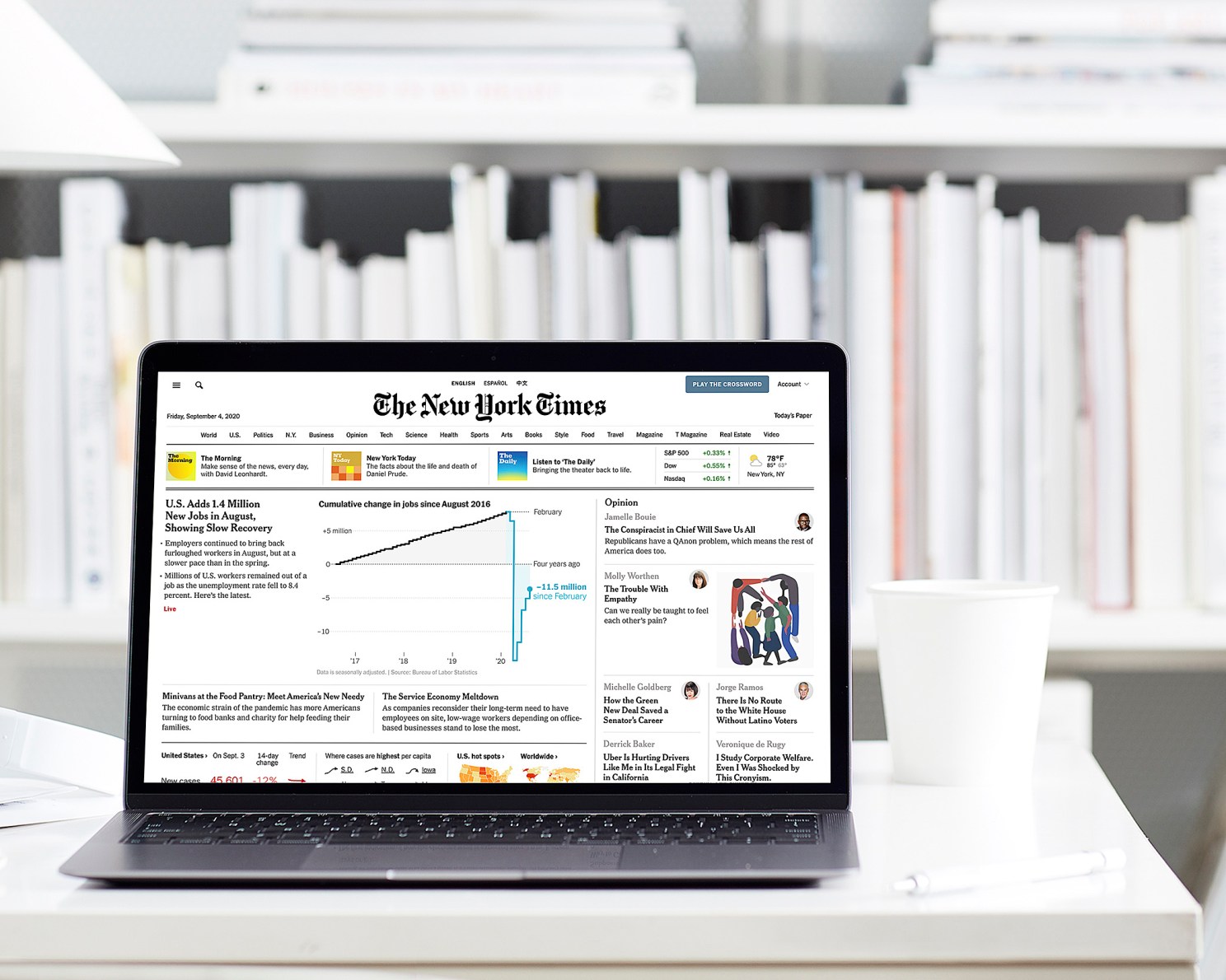 Laptop displays New York Times website