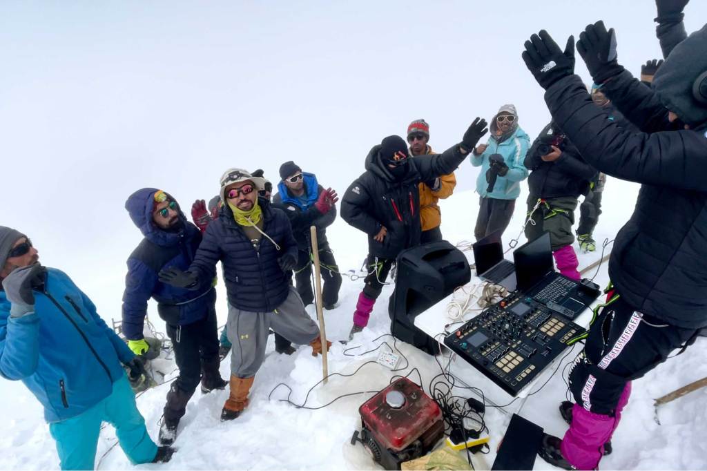 Dance party atop Minglik Sar in Pakistan.