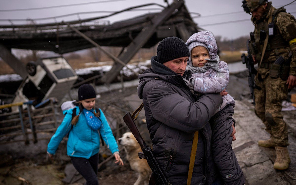 Fleeing family outside of Kyiv.