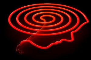 Illustration of person with headache. (Illustration by Peter Crowther / Ikon Images.)