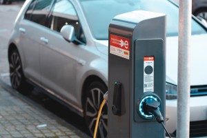 Electric vehicle at charging station.