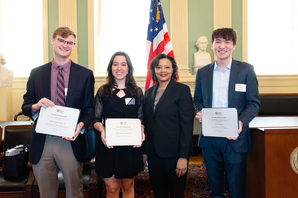 Harvard seniors Caleb King (from left), Sílvia Casacuberta Puig, Radcliffe Dean Tomiko Brown-Nagin, and Leo Saenger.