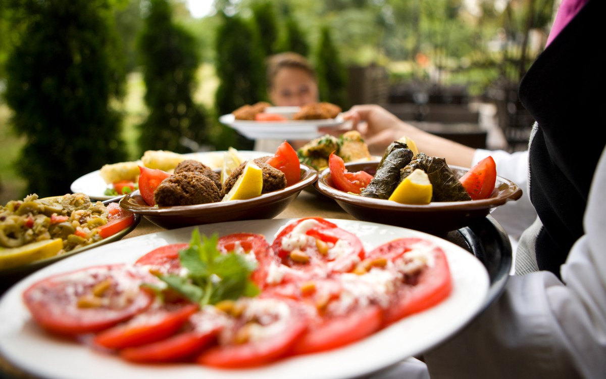 Mediterranean meal being shared.