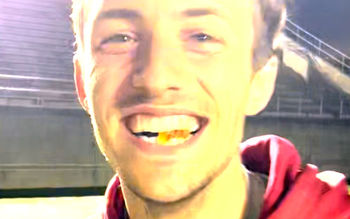 Will Sorenson clenches gummy bear he caught in his mouth between his teeth.