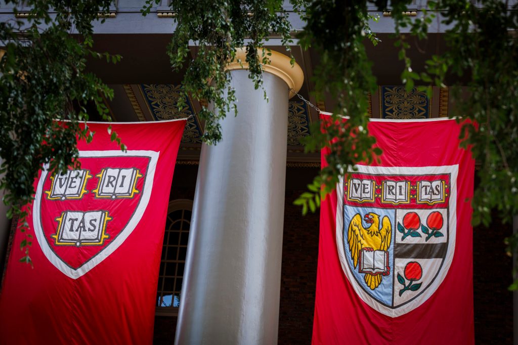 Veritas shields are on display outside Memorial Church.