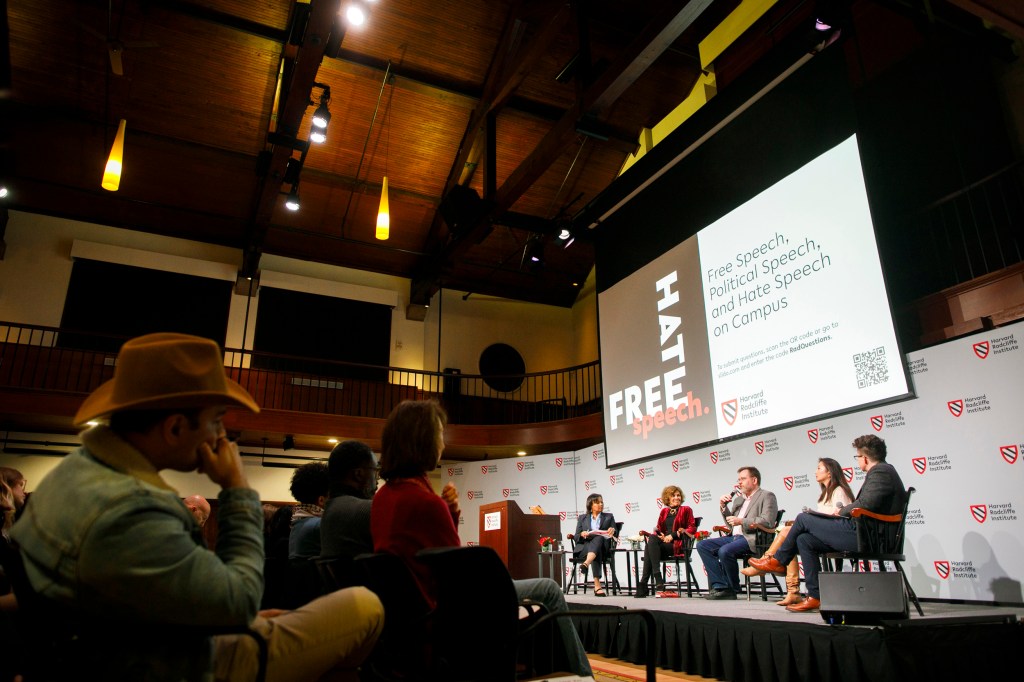 "Free Speech, Political Speech, and Hate Speech on Campus" panelists onstage.