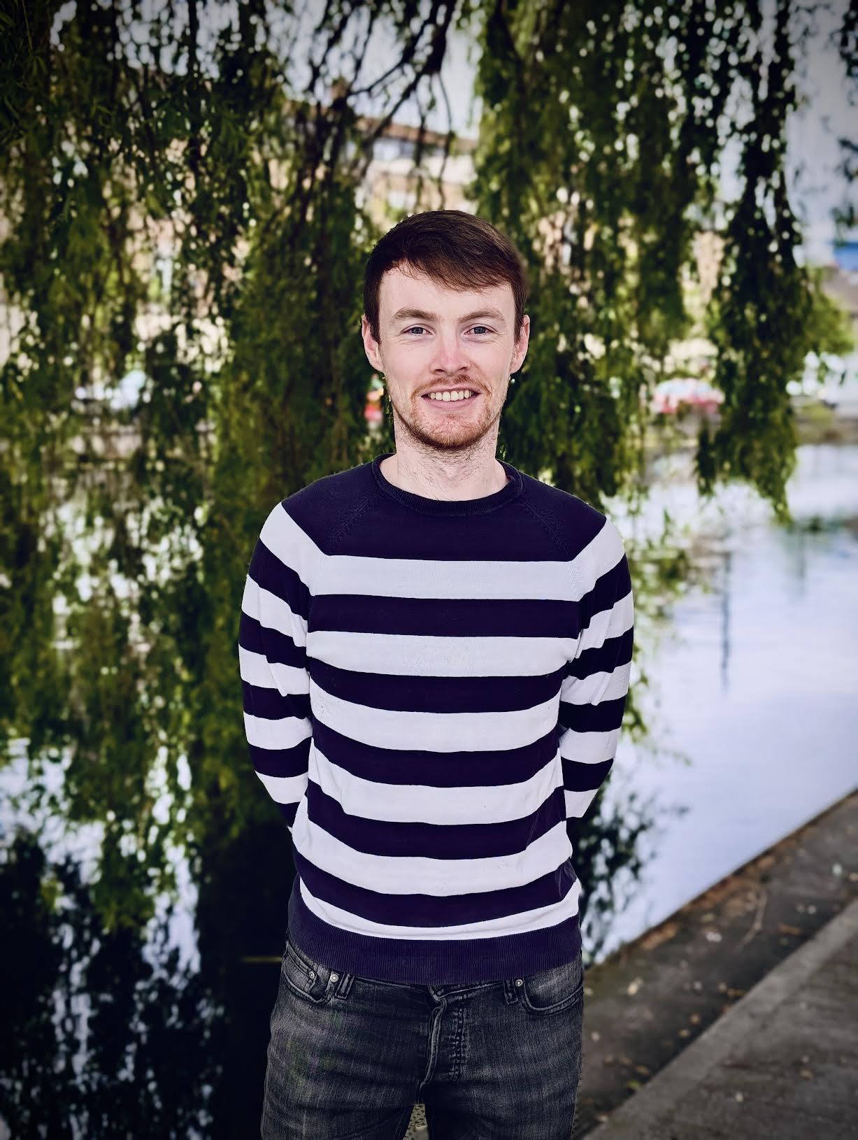 Headshot of Oisín Ó Muirthile.